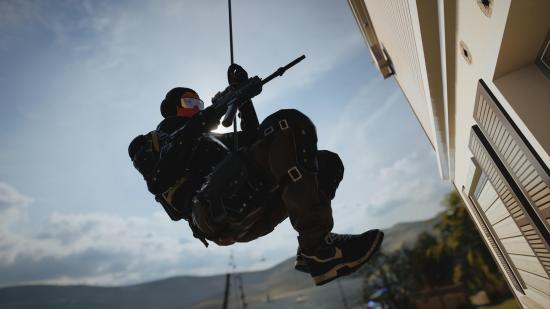 A Rainbow Six Siege player rappels down the side of a building. Who needs Rainbow Six Siege 2, anyway?