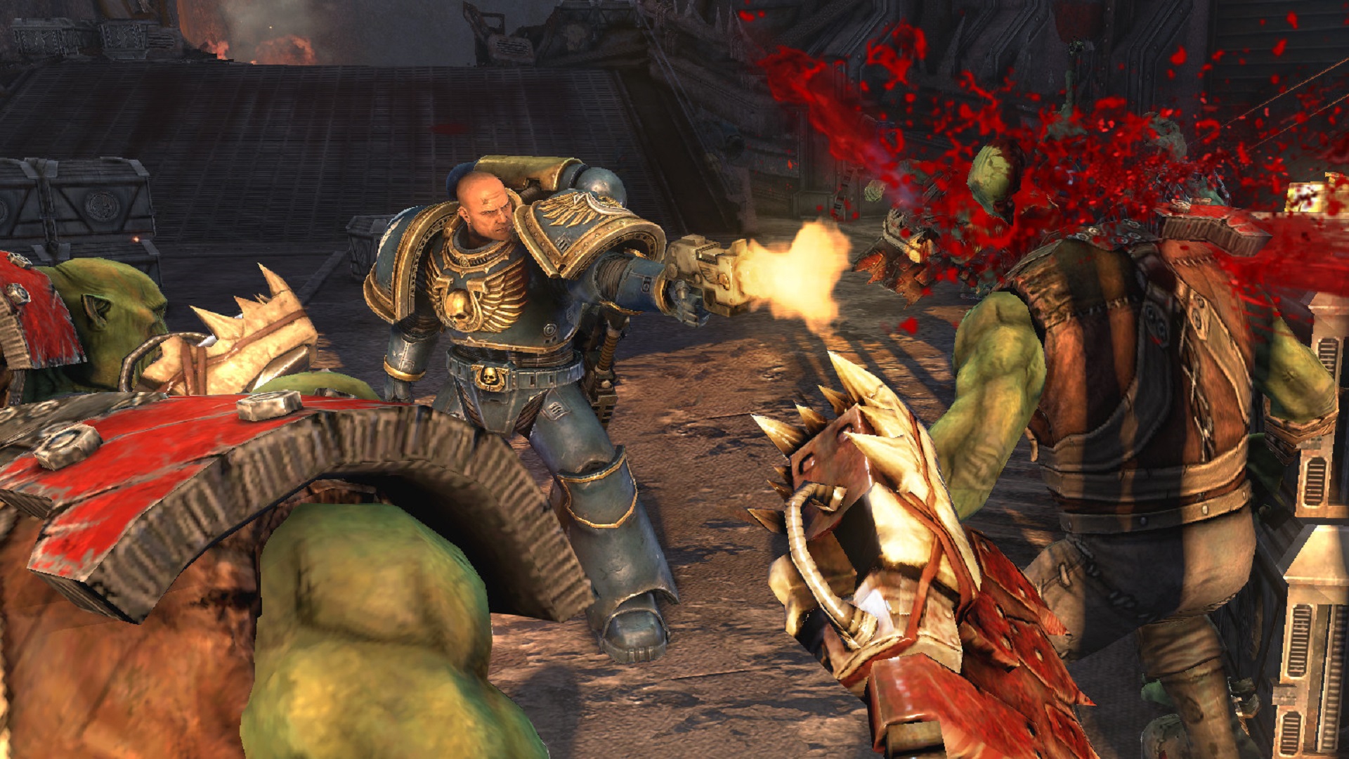 A 40K space marine fires at a couple of orks charging him in Warhammer 40,000 game Space Marine