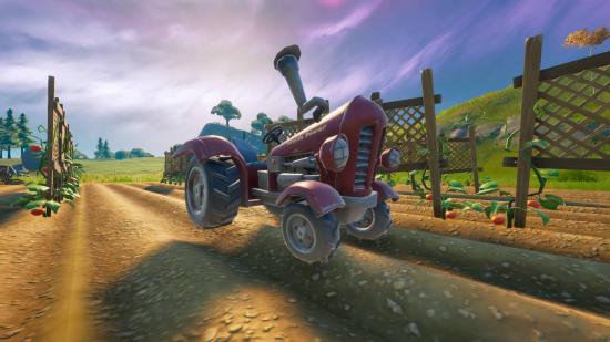 A shiny red tractor parked on a field in Fortnite.