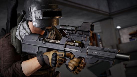 A character wearing a welding helmet and combat gloves shoulders a P90 submachine gun in PUBG: Battlegrounds.