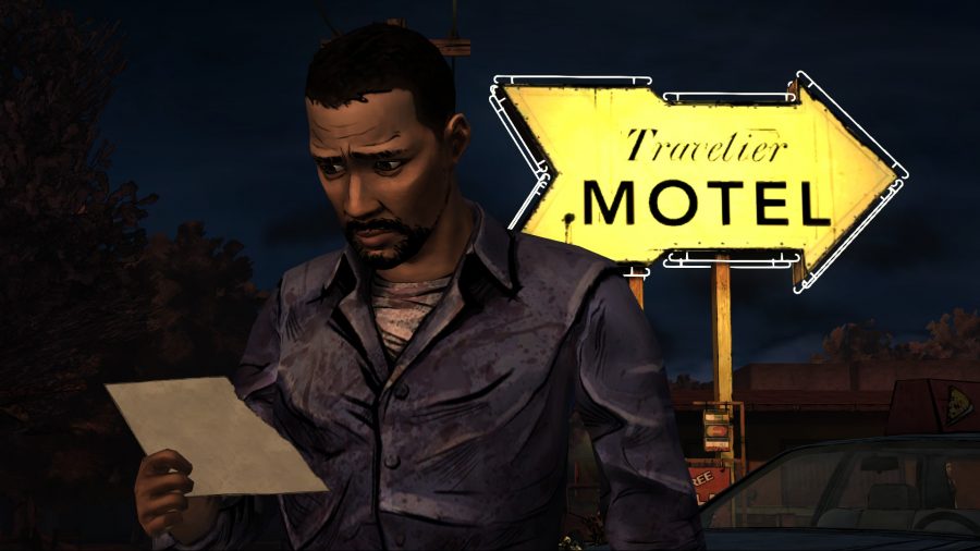 The Walking Dead game's Lee reading a letter outside of a motel