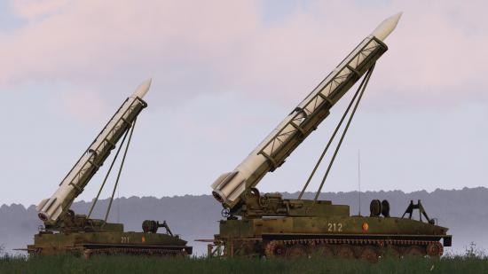 Two SP16 short-range ballistic missile launchers ready their 2K6 Luna missiles in Arma 3.