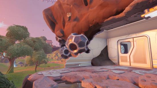 This countermeasure device stuck to the side of an island is the one the Fortnite mole has sabotaged.