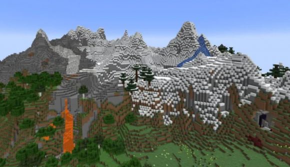 A snowy mountain range and grassy hills in Minecraft