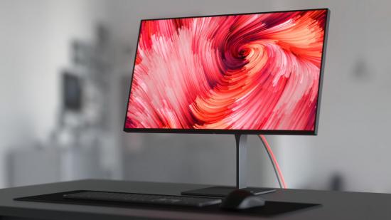 The Eve Spectrum 4K 144Hz sits on a gaming desk