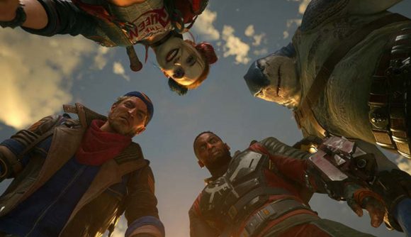 The Suicide Squad - Deadshot, Harley Quinn, King Shark, and Captain Boomerang - surround the camera
