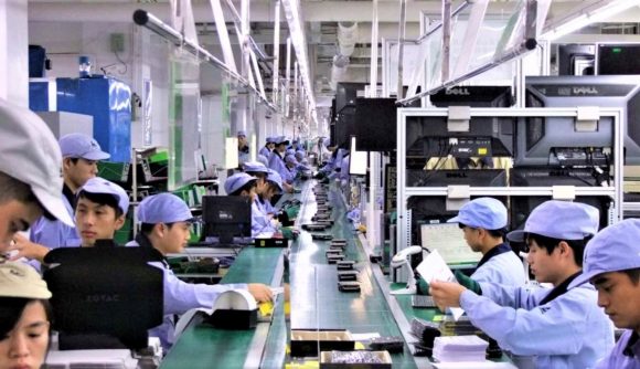 Photo of GPU factory with workers in protective clothing