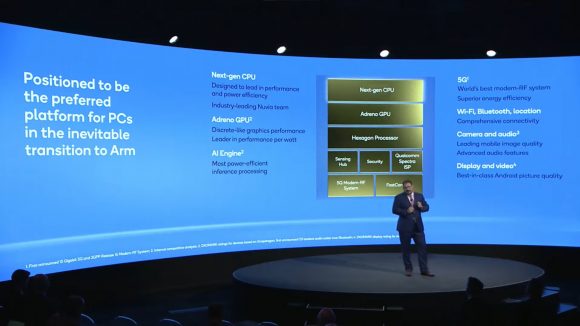 Qualcomm CEO Cristiano Amon stands in front of a slide detailing the company's vision for its next-gen CPU