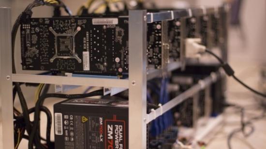 Cyrpto mining farm with rack and several GPUs