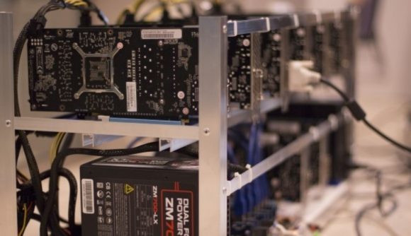 Cyrpto mining farm with rack and several GPUs