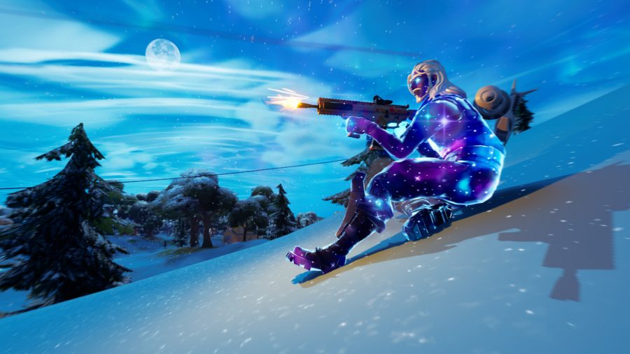 A Fortnite player sliding down a snowy mountain at night