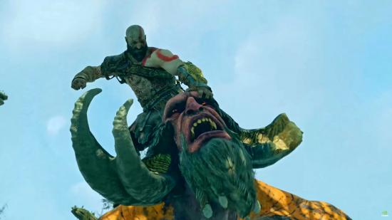 Kratos attacks a troll while perched atop its head in God of War.