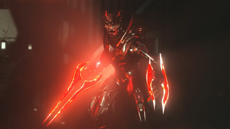 Jega ‘Rdomnai wielding two red energy swords as he prepares to attack Master Chief in Halo Infinite