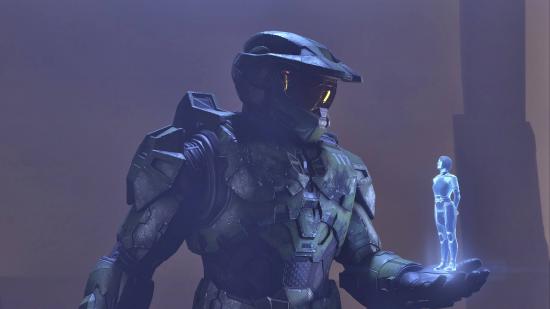 Master Chief is talking to the Weapon, an AI woman that is standing on his hand.