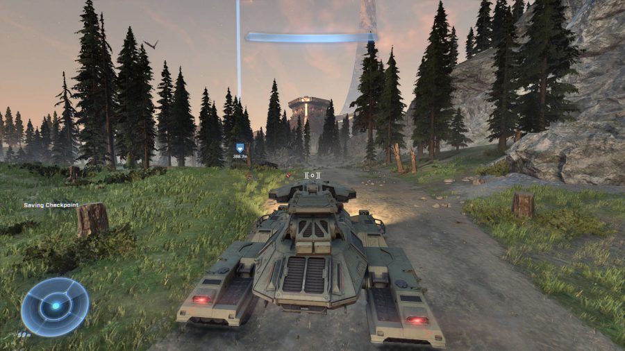 A scorpion tank is heading on a dirt track towards an enemy stronghold.