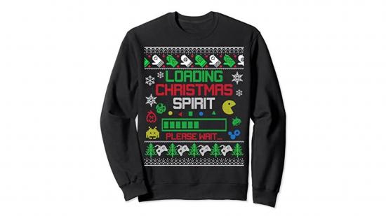 A great last minute gamer gift idea: a Christmas jumper featuring various pieces of gaming iconography, such as Pac-Man and Space Invaders, it has the text "Loading Christmas Spirit..." on it above a loading bar.