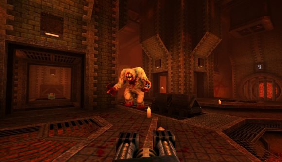 A large shambler approaches a player holding a nailgun in the Foundry level of Quake's new horde mode.