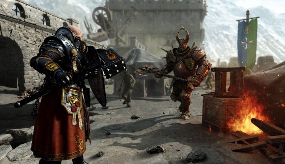 Victor Saltzpyre, wearing his new Warrior Priest garb, faces off against a chaos warrior in Vermintide 2.