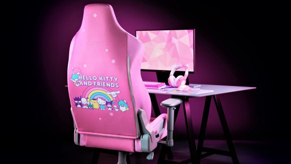 Razer Hello Kitty Collection setup with monitor, headset, desk, and chair with Hello Kitty print on back