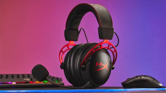 The HyperX Cloud Alpha Wireless sits upright on an RGB mouse pad