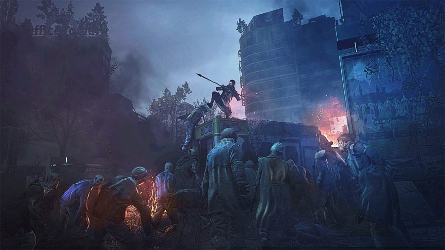 A man stands on a bus fending off a horde of undead in Dying Light 2, one of the best zombie games on PC