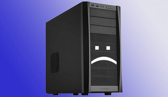 image of gaming PC with blue backdrop with a sad text face on front