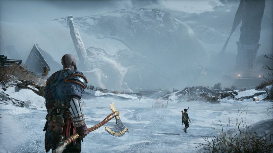 Kratos and Atreus exploring the snowy world in our God of War PC review