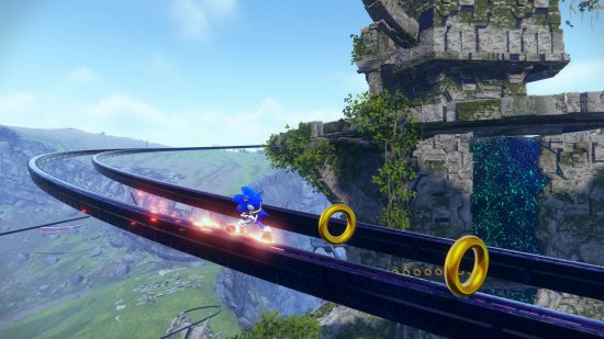 Release date Sonic Frontiers: Sonic rolls on rails to the rings.  Behind him is a huge open world.