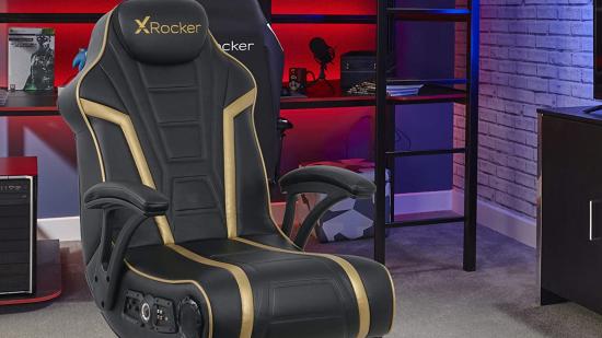 An X Rocker gaming chair sitting in front of a shelf full of gamer goodies.