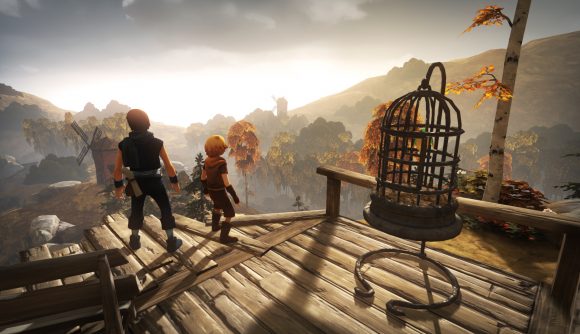 Two small boys stare at the horizon in Brothers: A Tale of Two Sons