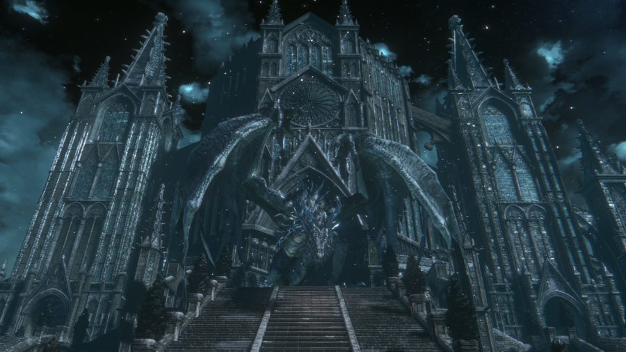 Facing a dragon outside of a gothic cathedral in the Convergence mod for Dark Souls 3