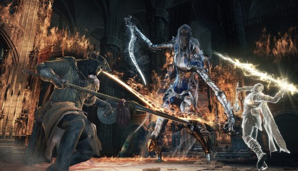 Players team up to battle a long-armed, masked boss in Dark Souls 3.
