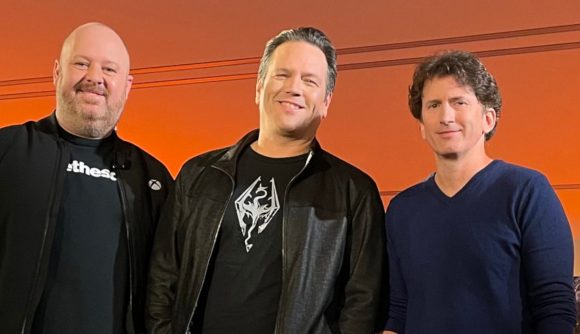 Aaron Greenberg, Phil Spencer, and Todd Howard pose for a photo together