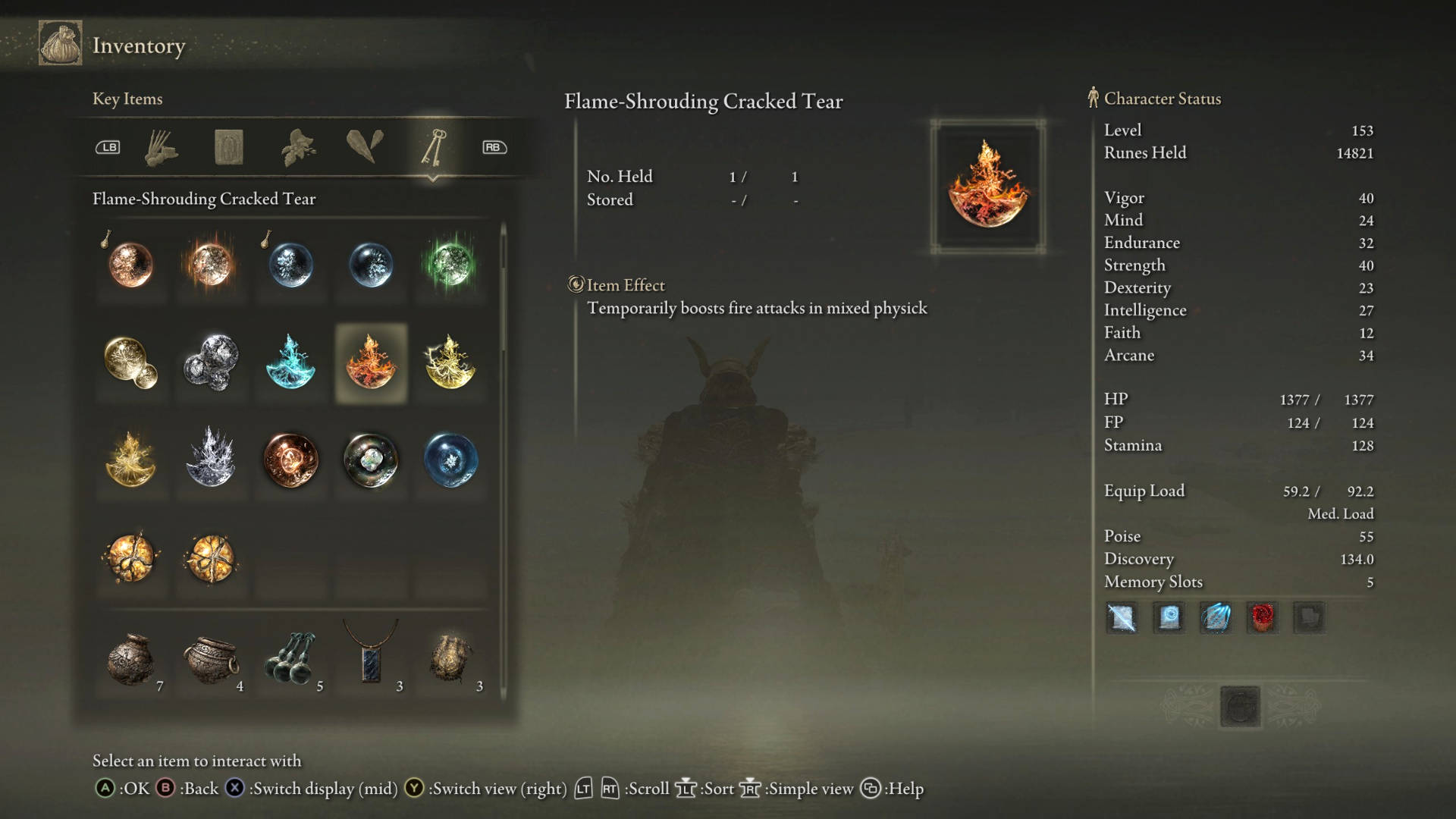 Elden Ring crystal tears: the Flame-shrouding Cracked tear in the inventory menu.
