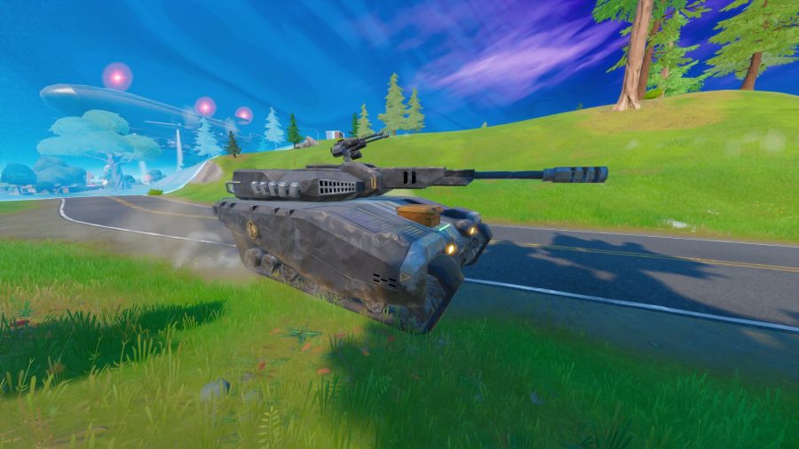 Fortnite tank locations: the player is driving a tank on a road.