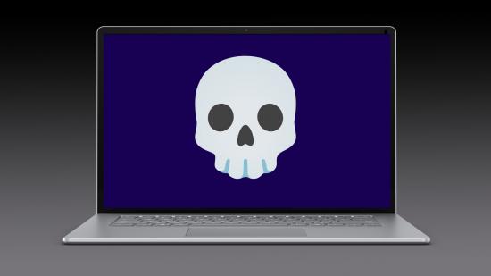 Lapsus$ teenage suspects: Microsoft Surface laptop with skull emoji and grey backdrop