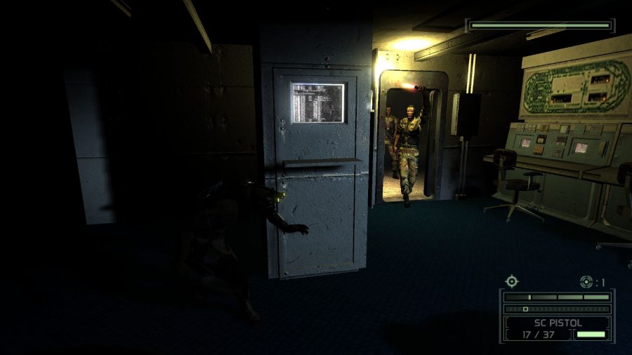 Splinter Cell remake stealth: Sam Fisher waiting in the shadows while a patrol passes