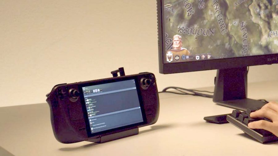 Station d'accueil Steam Deck : PC portable de Valve sur le bureau avec écran et clavier en vue