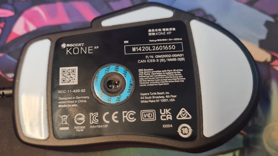 Roccat Kone XP review: the underside of the gaming mouse and the protective film still surrounding the sensor