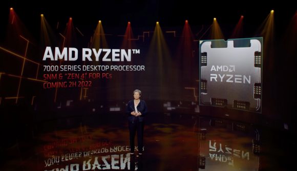 AMD CEO Dr Lisa Su stands on a stage with an AMD Zen 4 CPU behind her