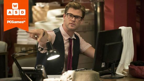 Get into games journalism: Chris Hemsworth sits at a desk, wearing a shirt and black waistcoat with a red tie, pointing authoritatively with a printer behind him in Ghostbusters (2016)