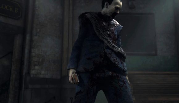 A zombie wearing a blood-spattered blue uniform holds a rusty pistol by the barrel in Hunt: Showdown.