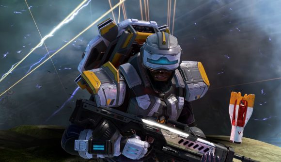 Apex Legends Newcastle rushes through a hail of gunfire, wearing a sci-fi knight's helmet and a shield on his back