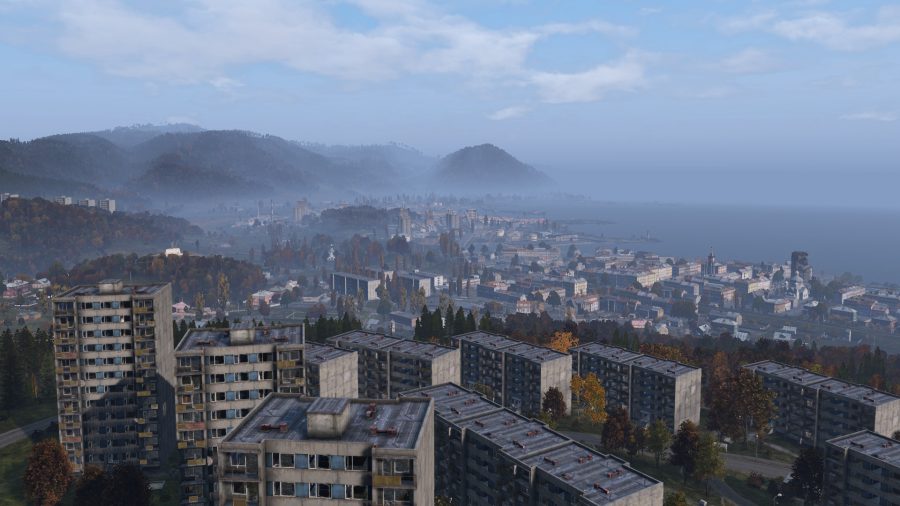 DayZ base building: An aerial view of a city in DayZ. with many buildings that could be used as bases