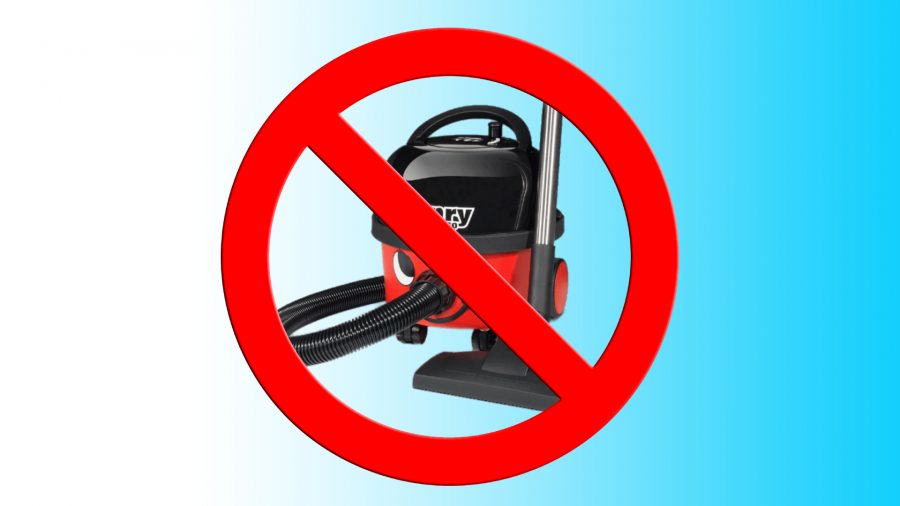 How to clean computer: Henry vacuum cleaner without sign on blue background
