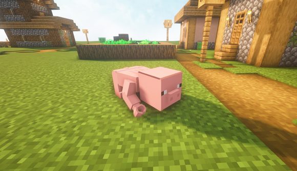 Minecraft mod: a pig who has been modded to look like a Lego figures crawls across the floor