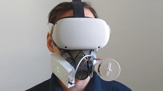 A researcher wearing a Quest 2 VR headset and AirRes Mask accessory