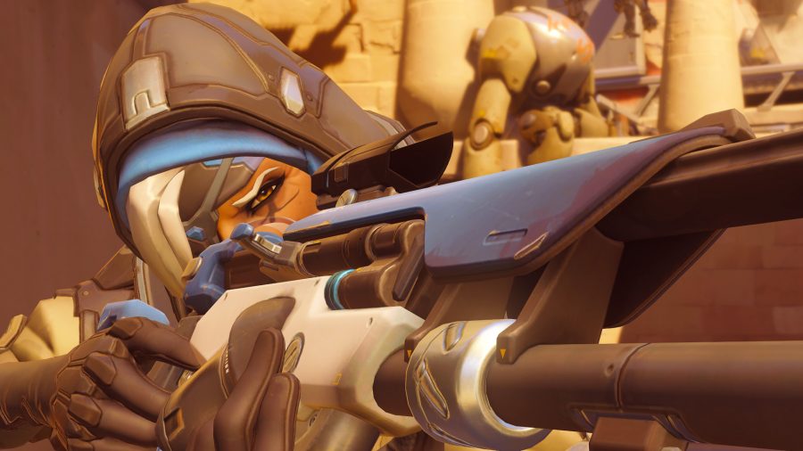Overwatch Top 2 Support Heroes: Ana aiming down sights with her Biotic Rifle