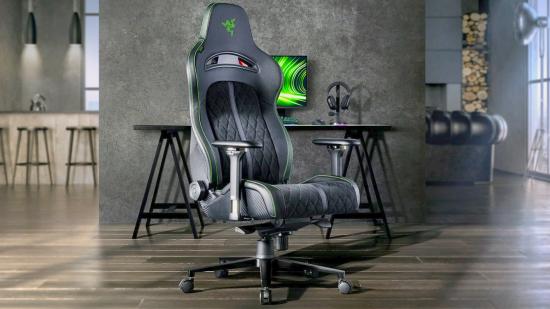 Razer Enki Pro gaming chair with desk and monitor in backdrop
