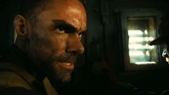 Call of Duty: Modern Warfare 2: A grimy soldier prepares his squad to exit the back of an assault vehicle in the live action teaser for Modern Warfare 2